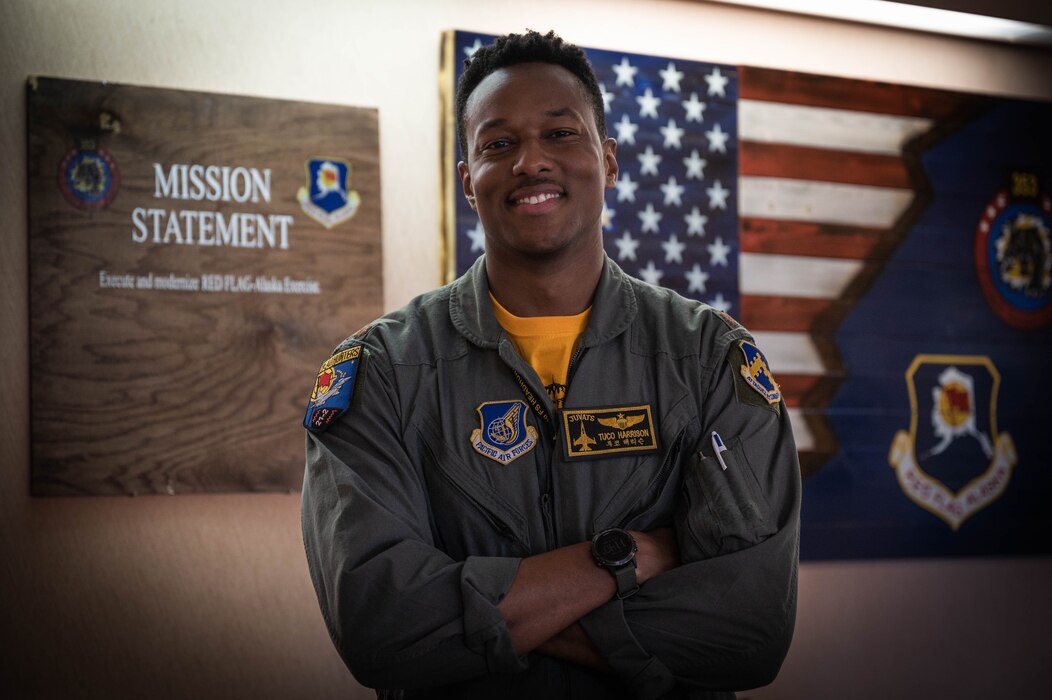 U.S. Air Force Maj. Christopher “Tuco” Harrison, the 80th Fighter Squadron assistant director of operations and chief of standards and evaluation, poses for a photo on Eielson Air Force Base, Alaska, June 18, 2021.