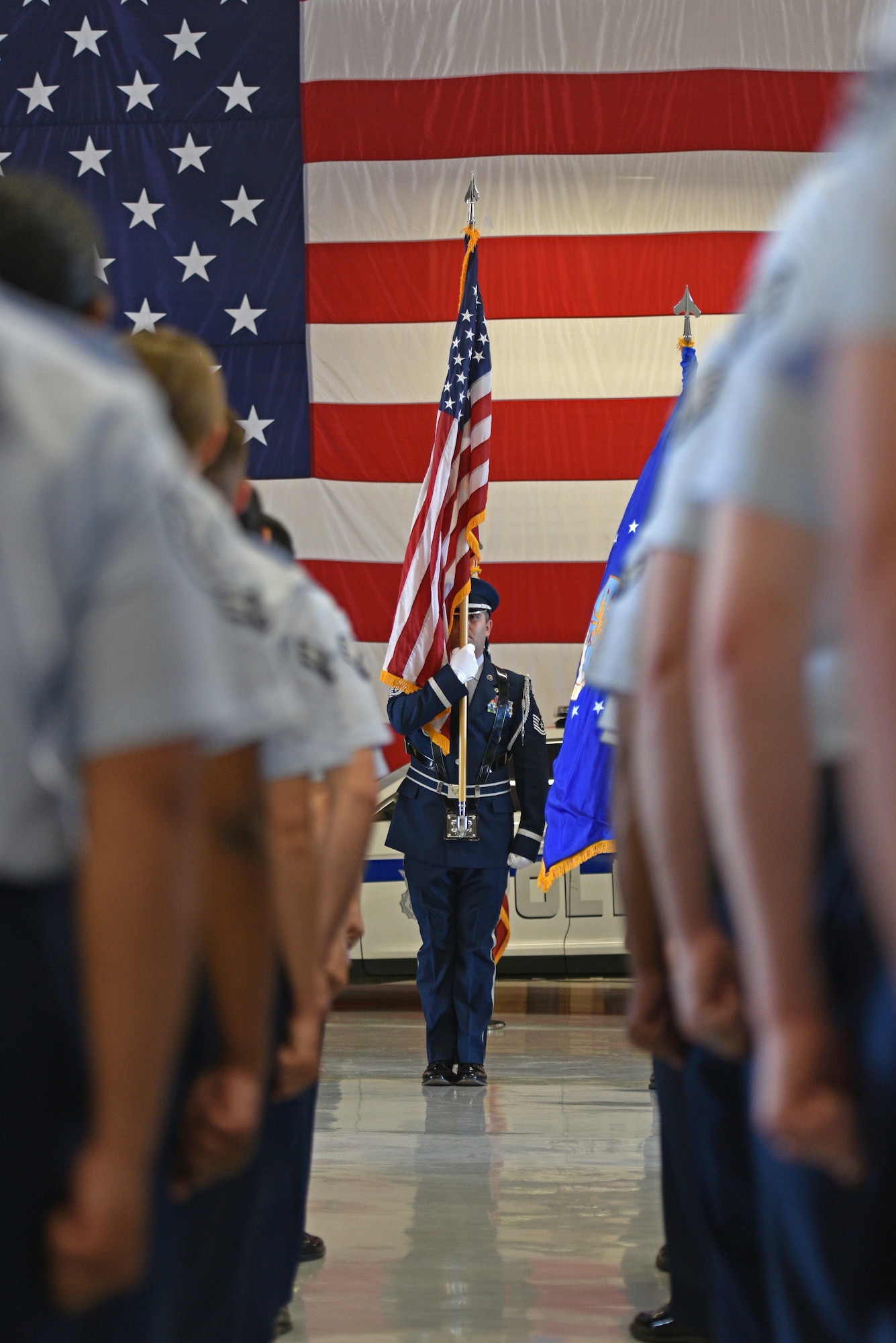The Goodfellow Air Force Base Color Guard presents the U.S. National Colors during the change of command ceremony at the 17th Logistics Readiness Squadron Vehicle Bay on Goodfellow Air Force Base, Texas, June 23, 2021. The primary purpose of the Color Guard is to present the National Colors during official ceremonies. (U.S. Air Force photo by Senior Airman Ashley Thrash)