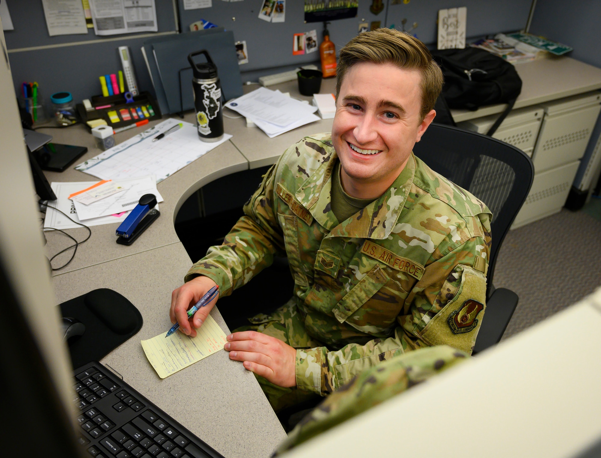 Staff Sgt. Hayden Ullery-Oatney, occupational safety apprentice poses for a photo June 22, 2021, at his desk in the 88th Air Base Wing Safety Office at Wright-Patterson Air Force Base, Ohio. Ullery-Oatney, who came out as at his first Air Force assignment, said he is seeing acceptance and progress for the LGBTQ community serving in the Air Force. (U.S. Air Force photo by R.J. Oriez)