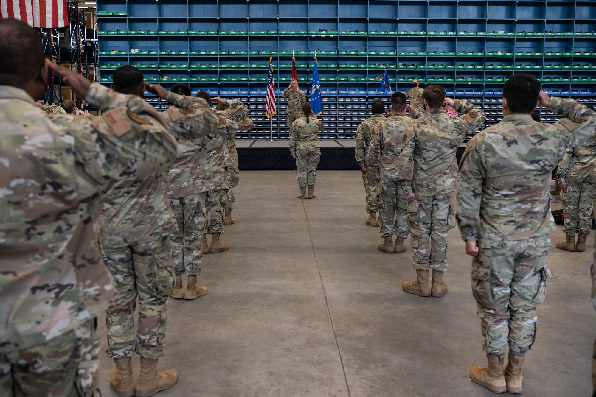 U.S. Air Force members of the 52nd Logistics Readiness Squadron salute their new commander.