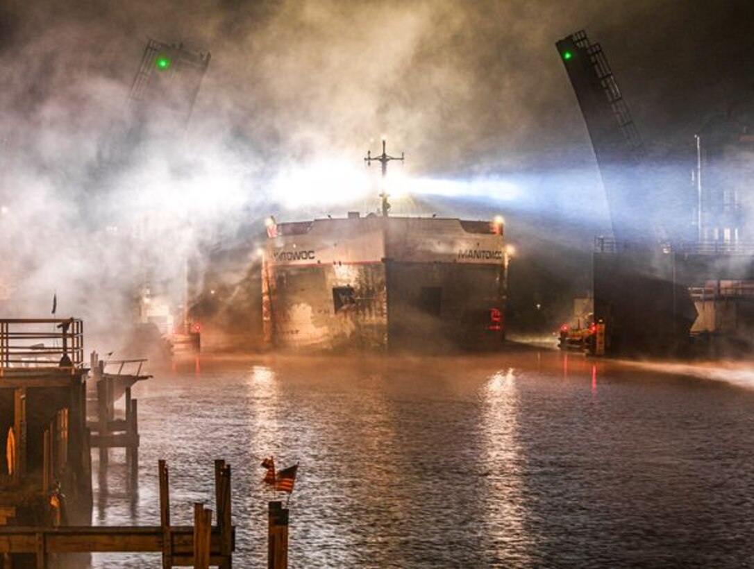 Manitowoc arriving Manistee, Mich. through a cloud of sea smoke.