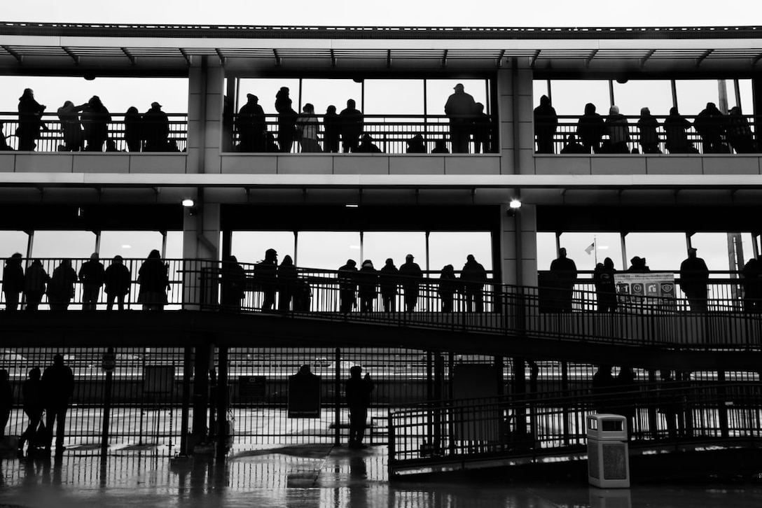 Many people braved the rain to watch the first freighters on Opening Day at the Soo Locks in Sault Ste. Marie, Michigan.