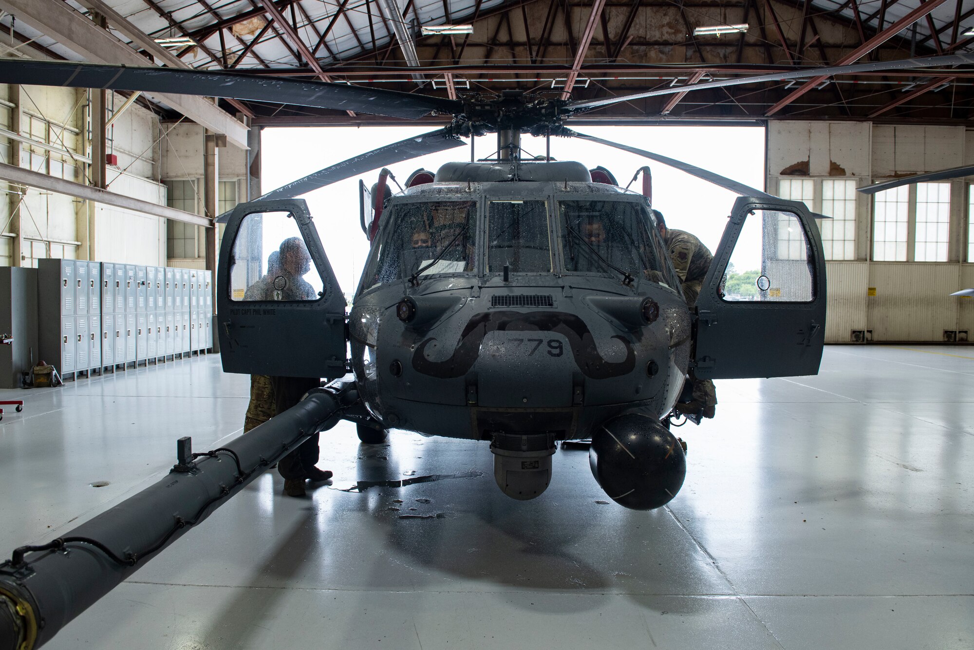 A photo of teens learning about helicopters.