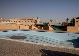 This June 14, 2021 photograph shows the now-drained pool of at Camp As Sayliyah-Main, Qatar, that the U.S. Army closed along with its two other installations, Camp As Sayliyah-South and Falcon 78, pending their transfer to the host country. Military and civilian guests to the Defense Department's Rest and Recuperation Pass Program located at CAS-Main from 2002 to 2011 had access to the pool.