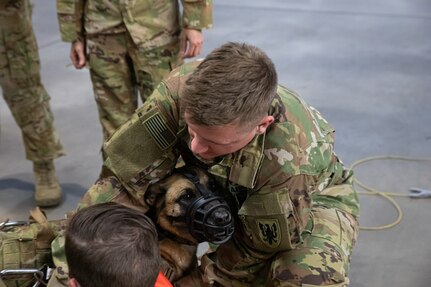 Army Reserve medevac company teaches military working dog handlers hoist procedures