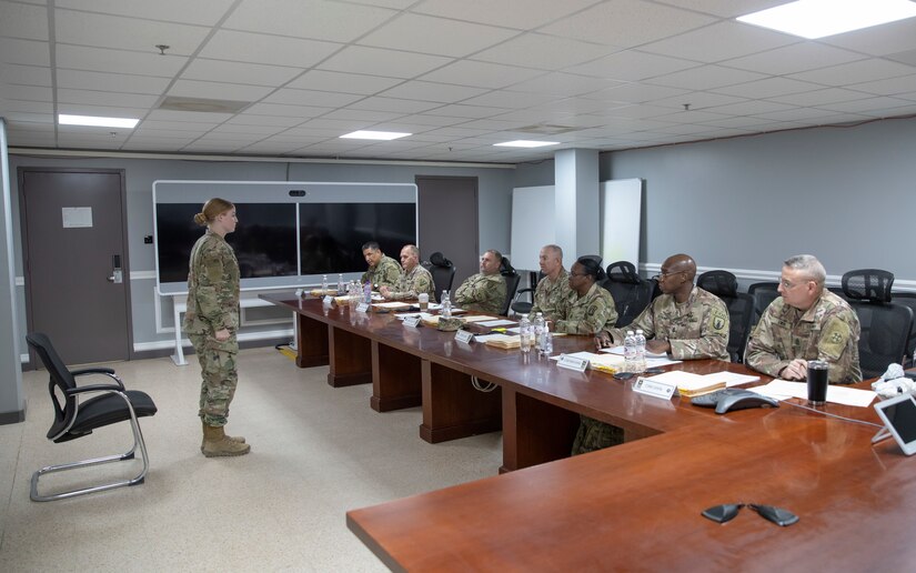 U.S. Army Spc. Rena Bailey, a wheeled vehicle mechanic assigned to Area Support Group - Kuwait, stands at attention during the board event as part of the U.S. Army Central 2021 Best Warrior Competition, Camp Arifjan, Kuwait, June 23, 2021. Competitors were asked various questions from command sergeants major, including vehicle maintenance, Army doctrine, and current events. (U.S. Army photo by Spc. Maximilian Huth, U.S. Army Central Public Affairs)