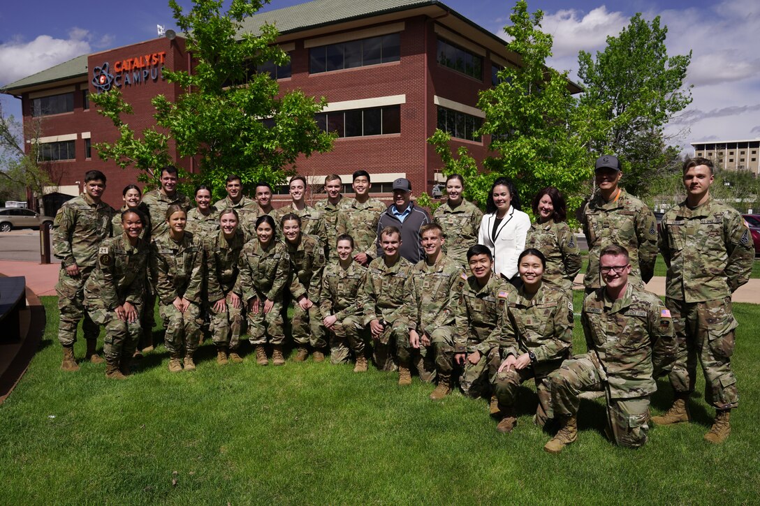 Space and Missile Systems Center commander Lt. Gen. John F. Thompson (center), leaders from the Cross Mission Ground and Communications Enterprise (ECX), Space Force Talent Management office, and newest United States Air Force Academy (USAFA) Guardian cadets pose for a photo at the first-ever "USAFA 6X'r Welcome to USSF" at Catalyst Campus on May 19, 2021, in Colorado Springs, Colo.  The event, hosted by the ECX’s Canopy team, consisted of opening remarks and "speed mentoring" sessions with 46 leaders across the U.S. Air Force and U.S. Space Force to share their personal knowledge and experience, positively impacting the overall mission by enhancing professional and personal development for future Guardians and leaders of the Space Force. This is the second class of cadets from the Air Force Academy to commission into the USSF. (U.S. Space Force courtesy photo)