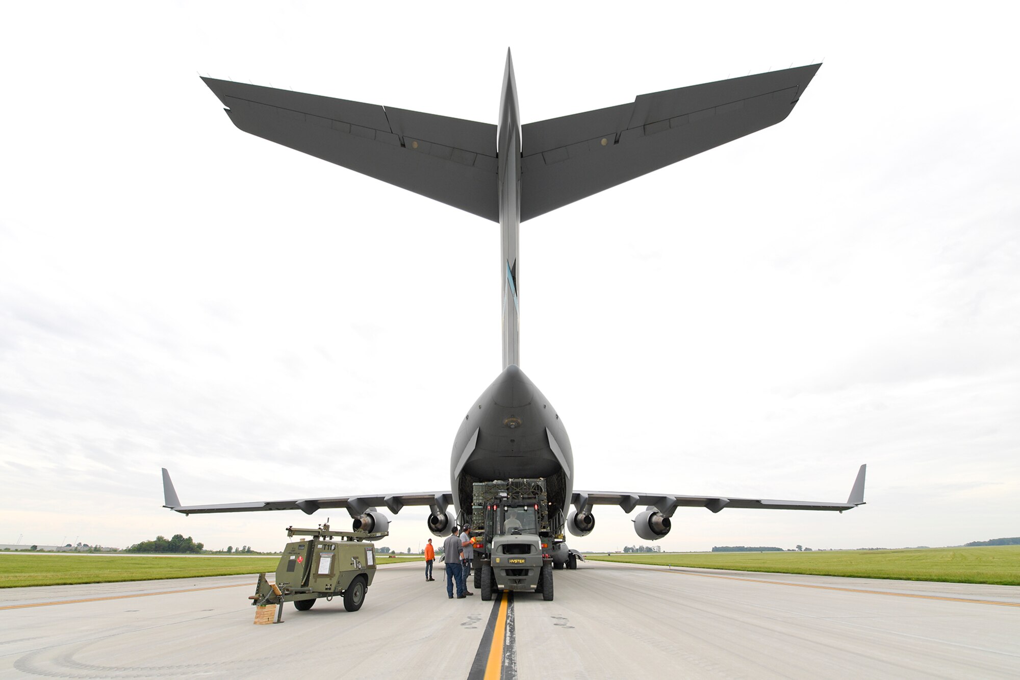 Cargo from Grissom is loaded onto a Hawaii-bound C-17 Globemaster III from Dover AFB, Del., June 1, 2021. Members of the Detachment 1, 622nd Contingency Equipment Group stationed at Grissom palletized and oversaw the cargo shipment for exercise Pacific Warriorz 2021. (U.S. Air Force photo/Staff Sgt. Chris Massey)