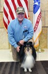 Picture of volunteer and his dog