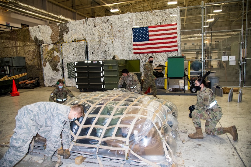 Airmen ready a pallet for deployment.