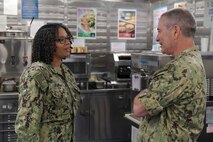 NAVAL STATION NORFOLK (June 23, 2021) Vice Adm. Roy Kitchener, Commander, Naval Surface Force, U.S. Pacific Fleet, speaks with Hospitalman Shakeelah Jordan aboard the Arleigh Burke-class guided missile-destroyer USS Winston S. Churchill (DDG 81) during a ship visit. Kitchener visited Hampton Roads commands and ships June 22-23, and hosted a commander’s call with waterfront leadership. (U.S. Navy photo by Mass Communication Specialist 2nd Class Jacob Milham/Released)