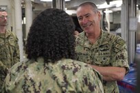 NAVAL STATION NORFOLK (June 23, 2021) Vice Adm. Roy Kitchener, Commander, Naval Surface Force, U.S. Pacific Fleet, speaks with Hospitalman Shakeelah Jordan aboard the Arleigh Burke-class guided missile-destroyer USS Winston S. Churchill (DDG 81) during a ship visit. Kitchener visited Hampton Roads commands and ships June 22-23, and hosted a commander’s call with waterfront leadership. (U.S. Navy photo by Mass Communication Specialist 2nd Class Jacob Milham/Released)