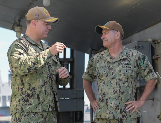 NAVAL STATION NORFOLK (June 23, 2021) Cmdr. Timothy Shanley, commanding officer of the Arleigh Burke-class guided missile-destroyer USS Winston S. Churchill (DDG 81), speaks with Vice Adm. Roy Kitchener, Commander, Naval Surface Force, U.S. Pacific Fleet, during a ship visit. Kitchener visited Hampton Roads commands and ships June 22-23, and hosted a commander’s call with waterfront leadership. (U.S. Navy photo by Mass Communication Specialist 2nd Class Jacob Milham/Released)