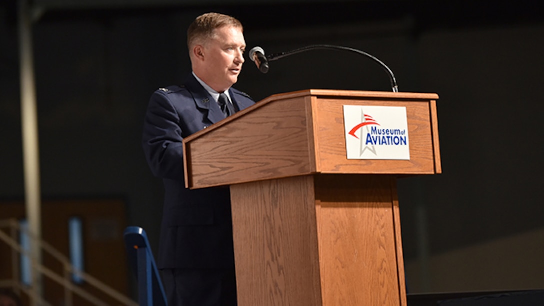 Air Force Col. Brian Mayer gives remarks after assuming command.
