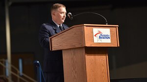 Air Force Col. Brian Mayer gives remarks after assuming command.