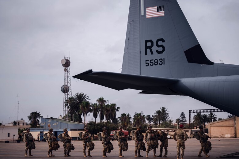 U.S. Army Airborne paratroopers assigned to the 173rd Infantry Brigade Combat Team board a C-130J Super Hercules aircraft assigned to the 37th Airlift Squadron, Ramstein Air Base, Germany, during exercise African Lion 21, June 18, 2021. Airmen train to enhance their ability to rapidly deploy to and operate from locations with varying levels of capacity and support, ensuring they are postured to provide lethal combat power across the spectrum of military operations. African Lion is a multi-domain, multi-component, and multinational exercise, which employs a full array of mission capabilities with the goal to strengthen interoperability among participants. (U.S. Air Force photo by Tech. Sgt. Devin Nothstine)