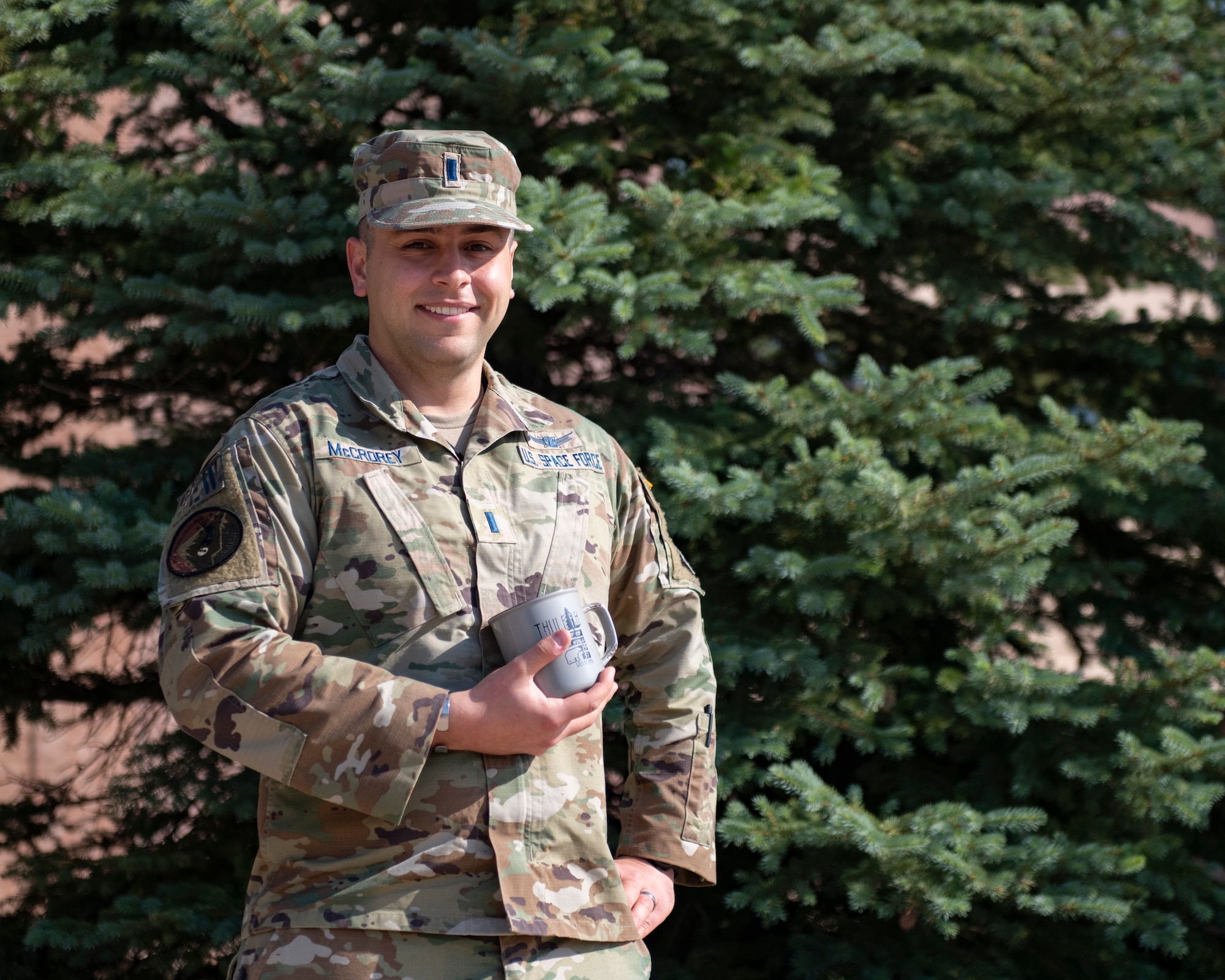 Man holds coffee cup