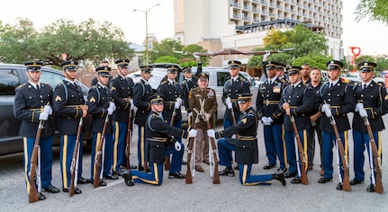 Lt. Gen. Douglas Gabram, commanding general, U.S. Army Installation Management Command, poses with the U.S. Army Drill Team.