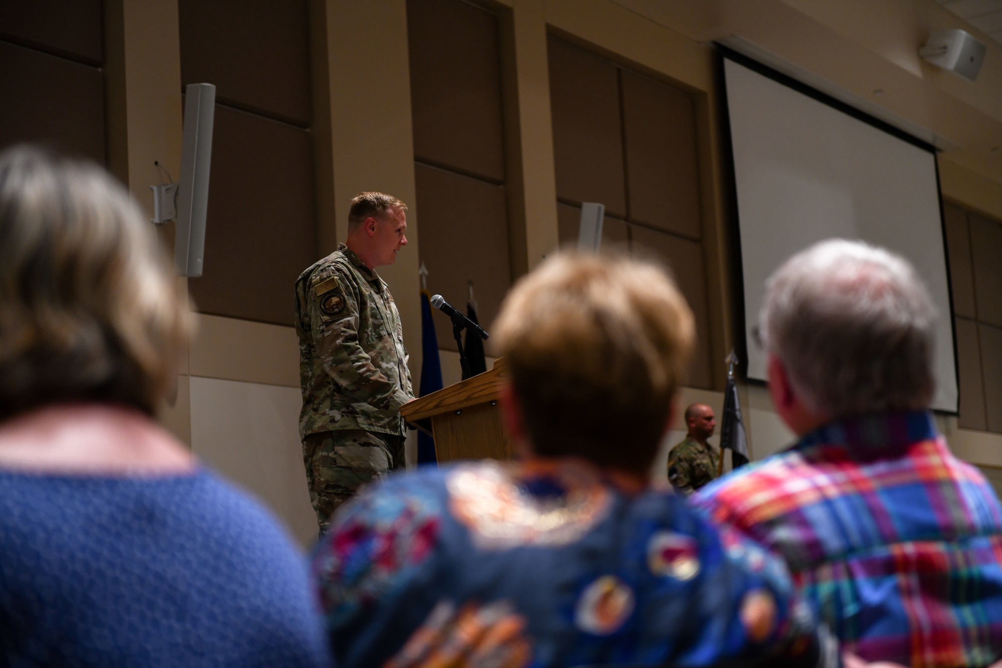 Maj. Luke Basham, Space Delta 4, Detachment 1 commander, addresses the crowd after the transferring of leadership during the DEL 4, DET 1 change of command ceremony at Buckley Space Force Base, Colo., June 24, 2021. Basham introduced himself and expressed his gratitude and excitement for the opportunity to lead the Airmen and Guardians of DET 1. (U.S. Space Force photo by Airman 1st Class Shaun Combs)