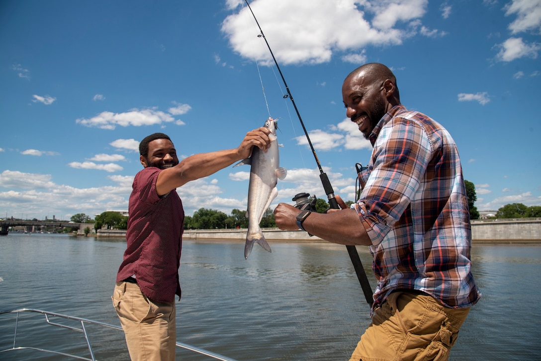 Recovering service members learn to fish.