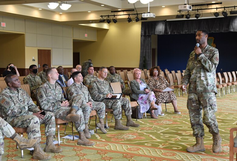 U.S. Air Force Senior Airman Ronald Dailey, 81st Comptroller Squadron financial operations technician, delivers remarks to attendees during a Juneteenth ceremony inside the Bay Breeze Event Center at Keesler Air Force Base, Mississippi, June 23, 2021. June 19, other wise known as Juneteenth, is an annual observance of the emancipation of slaves in the state of Texas. (U.S. Air Force photo by Kemberly Groue)