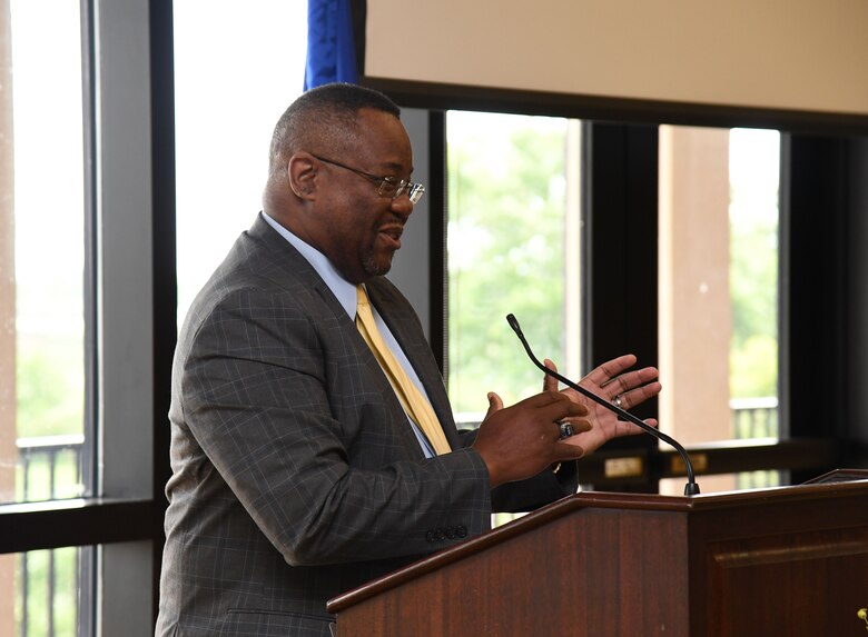 Kurt Higgins, 81st Training Support Squadron faculty development chief, delivers remarks to attendees during a Juneteenth ceremony inside the Bay Breeze Event Center at Keesler Air Force Base, Mississippi, June 23, 2021. June 19, other wise known as Juneteenth, is an annual observance of the emancipation of slaves in the state of Texas. (U.S. Air Force photo by Kemberly Groue)