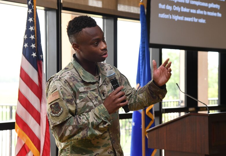 U.S. Air Force 1st Lt. Gerald Peden, Public Affairs Officer, delivers remarks to attendees during a Juneteenth ceremony inside the Bay Breeze Event Center at Keesler Air Force Base, Mississippi, June 23, 2021. June 19, other wise known as Juneteenth, is an annual observance of the emancipation of slaves in the state of Texas. (U.S. Air Force photo by Kemberly Groue)