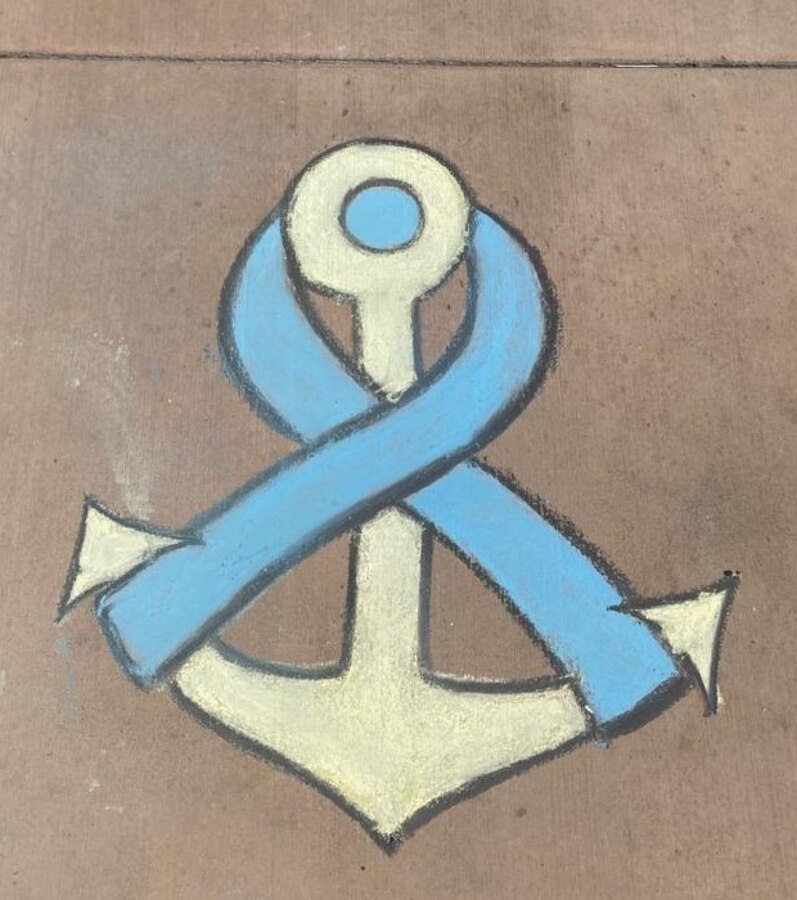 A completed art piece by HM1 Teresa Perkins, 17A Bravo Company, 1st Medical Battalion, 1st Marine Logistics Group, is showcased to bring awareness to Sexual Assault Awareness and Prevention Month (SAAPM). April is SAAPM, and Marine Corps Installations West, Marine Corps Base Camp Pendleton, is hosting a Chalk the Walk competition from April 1st- 20th, promoting the ongoing theme: Protecting Our People Protects Our Mission. (U.S. Marine Corps Photo by Cpl. Stephen Beard)