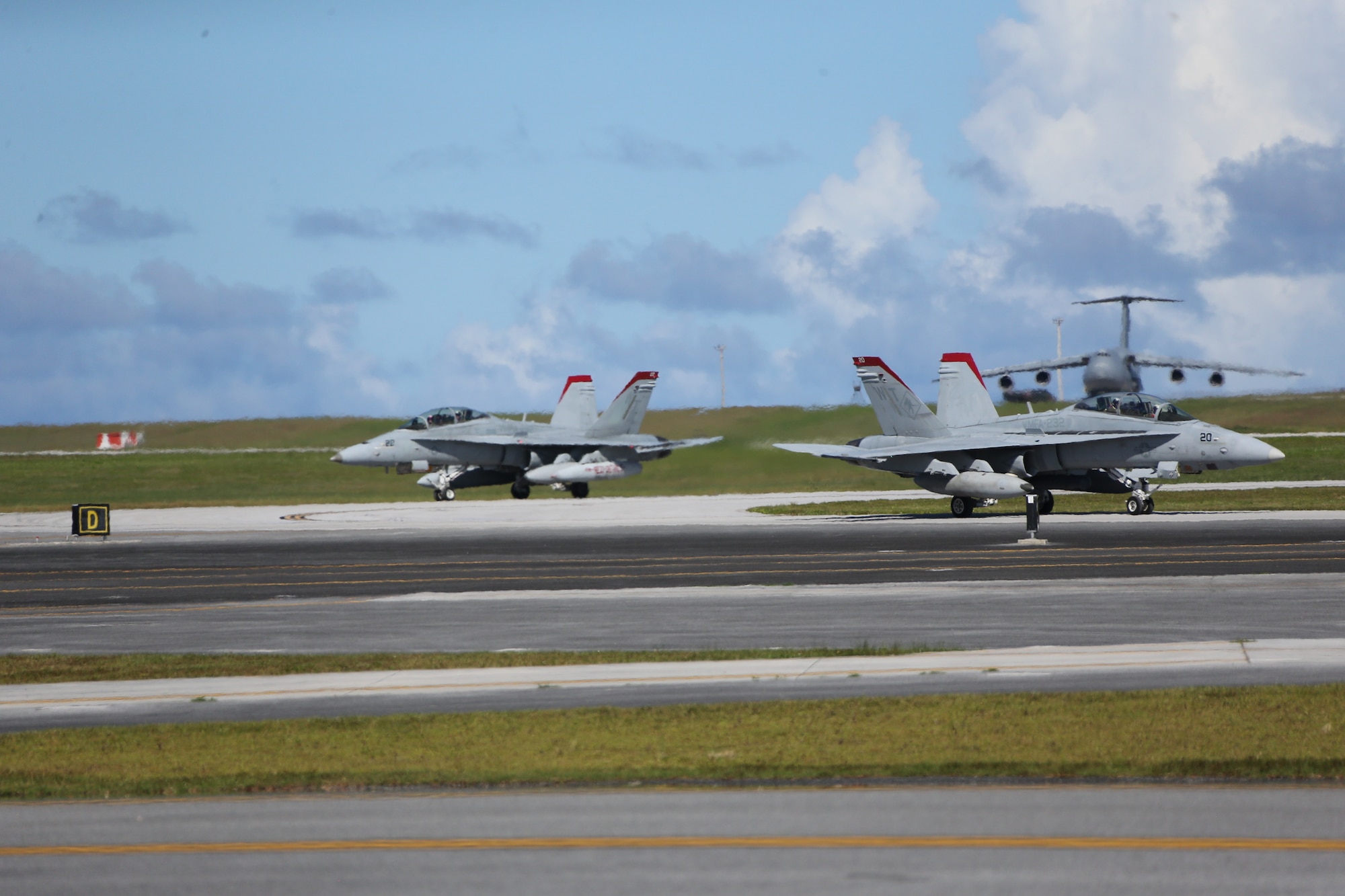 Marine Fighter Attack Squadron 232 arrives on Andersen Air Force Base, Guam to conduct training and participate in regional exercises, June 16, 2021. The training and exercises enable the squadron to increase operational readiness, improve interoperability and meet training requirements. Marine Corps Base Camp Blaz supports the squadron by providing them aviation hangars and spaces to perform maintenance and repair aircraft. MCB Camp Blaz continues to support units in the region by providing critical administrative and logistical support enabling them conduct training and maintain readiness. (U.S. Marine Corps Photo by Gunnery Sgt. John Ewald)
