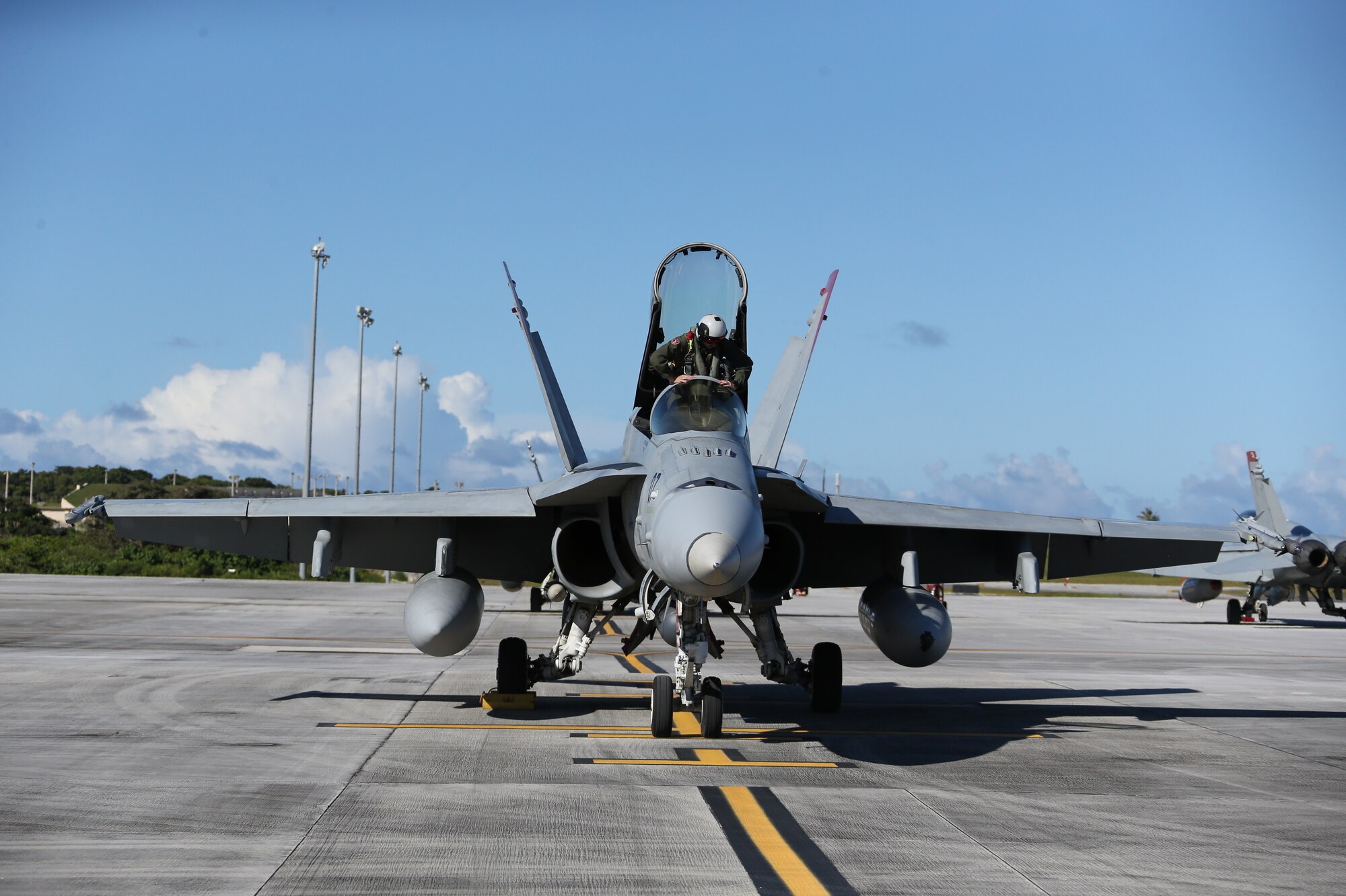 U.S. Marine Corps Capt. Zach Harvey with Marine Fighter Attack Squadron 232 arrives on Andersen Air Force Base, Guam to conduct training and participate in regional exercises, June 16, 2021. The training and exercises enable the squadron to increase operational readiness, improve interoperability and meet training requirements. Marine Corps Base Camp Blaz supports the squadron by providing them aviation hangars and spaces to perform maintenance and repair aircraft. MCB Camp Blaz continues to support units in the region by providing critical administrative and logistical support enabling them conduct training and maintain readiness. (U.S. Marine Corps Photo by Gunnery Sgt. John Ewald)