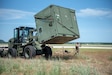 Airmen from the Kentucky Air National Guard’s 123rd Contingency Response Group set up their base of operations for a Joint Task Force-Port Opening exercise known as Operation Lone Oak on June 7, 2021, at Volk Field, Wis. The objective of a JTF-PO is to establish a complete air logistics hub and surface distribution network from scratch. (U.S. Air National Guard photo by Senior Master Sgt. Vicky Spesard)