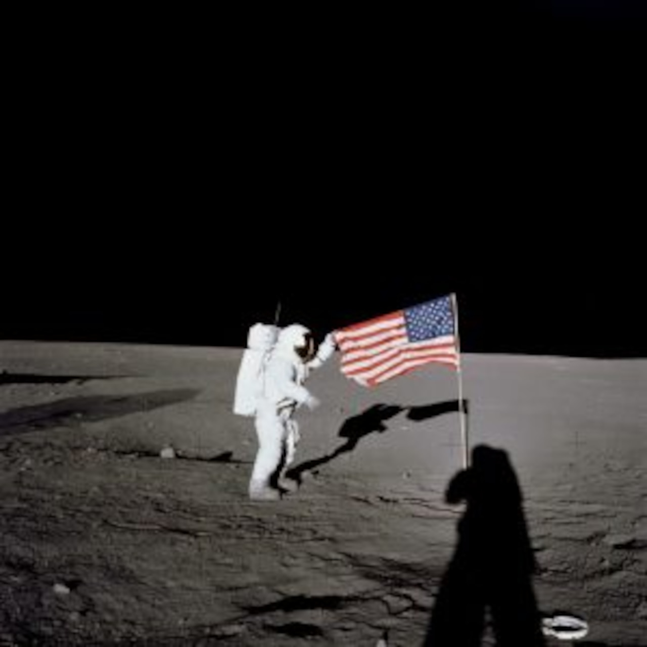 Astronaut On Moon By The American Flag