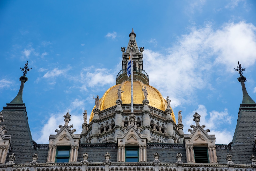 The flag of the Oriental Republic of Uruguay is displayed over the State Capitol Building in Hartford, Conn., June 15, 2021. The flag was flown as a gesture of solidarity between the Armed Forces of Uruguay and the Connecticut National Guard during a bilateral visit for the State Partnership Program.