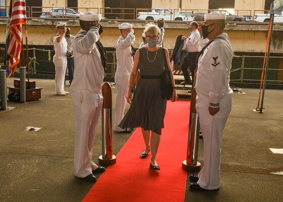 (JUNE 23, 2021) Amy Holman, the deputy chief of mission to the U.S. Embassy in Senegal, passes through the side boys as she boards the Expeditionary Sea Base USS Hershel “Woody” Williams (ESB 4) in Dakar, Senegal, June 23, 2021. Hershel “Woody” Williams is on a scheduled deployment in the U.S. Sixth Fleet area of operations in support of U.S. national interests and security in Europe and Africa.