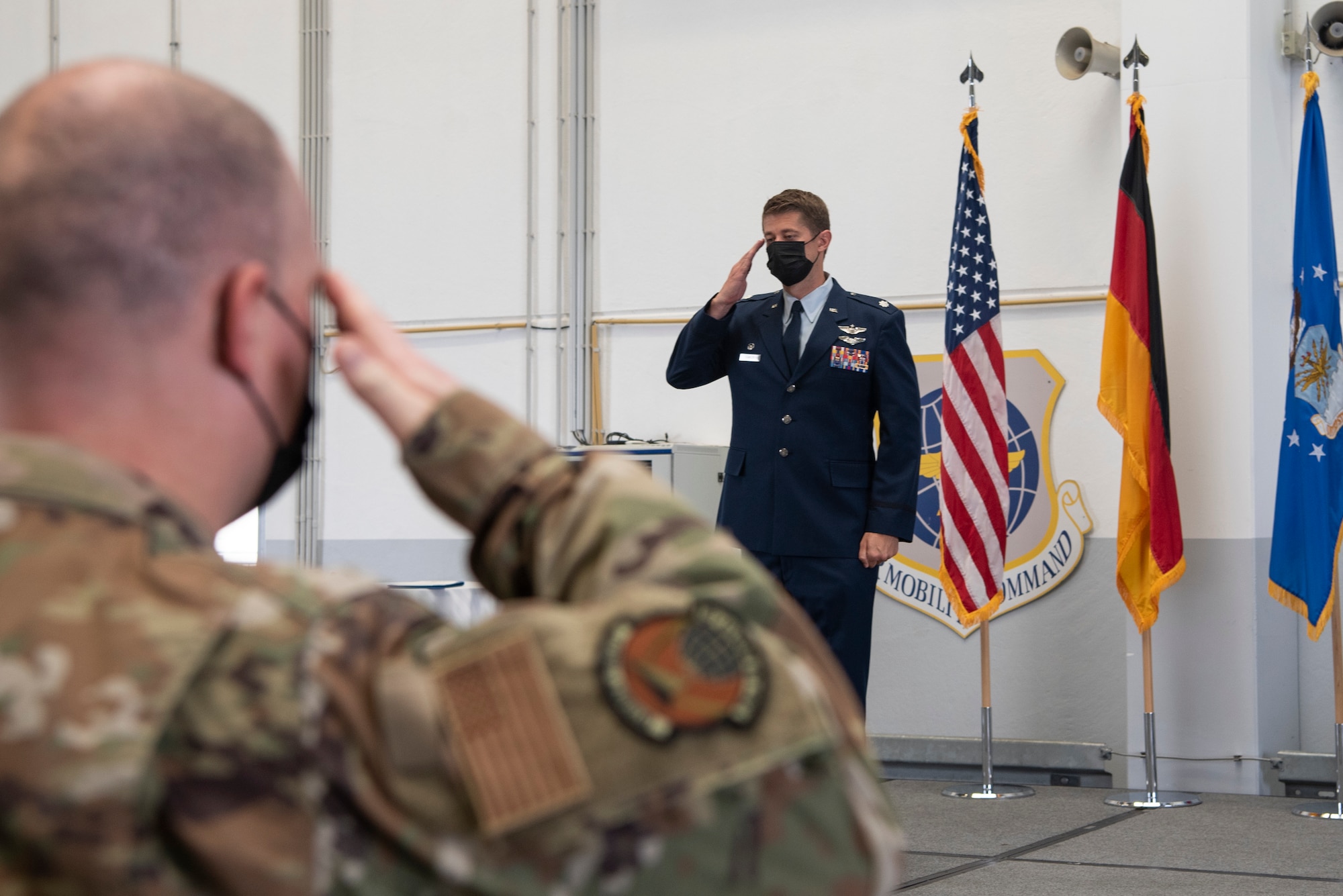 U.S. Air Force Lt. Col. Joshua Coakley, the new 726th Air Mobility Squadron commander, returns the first salute to the 726th AMS