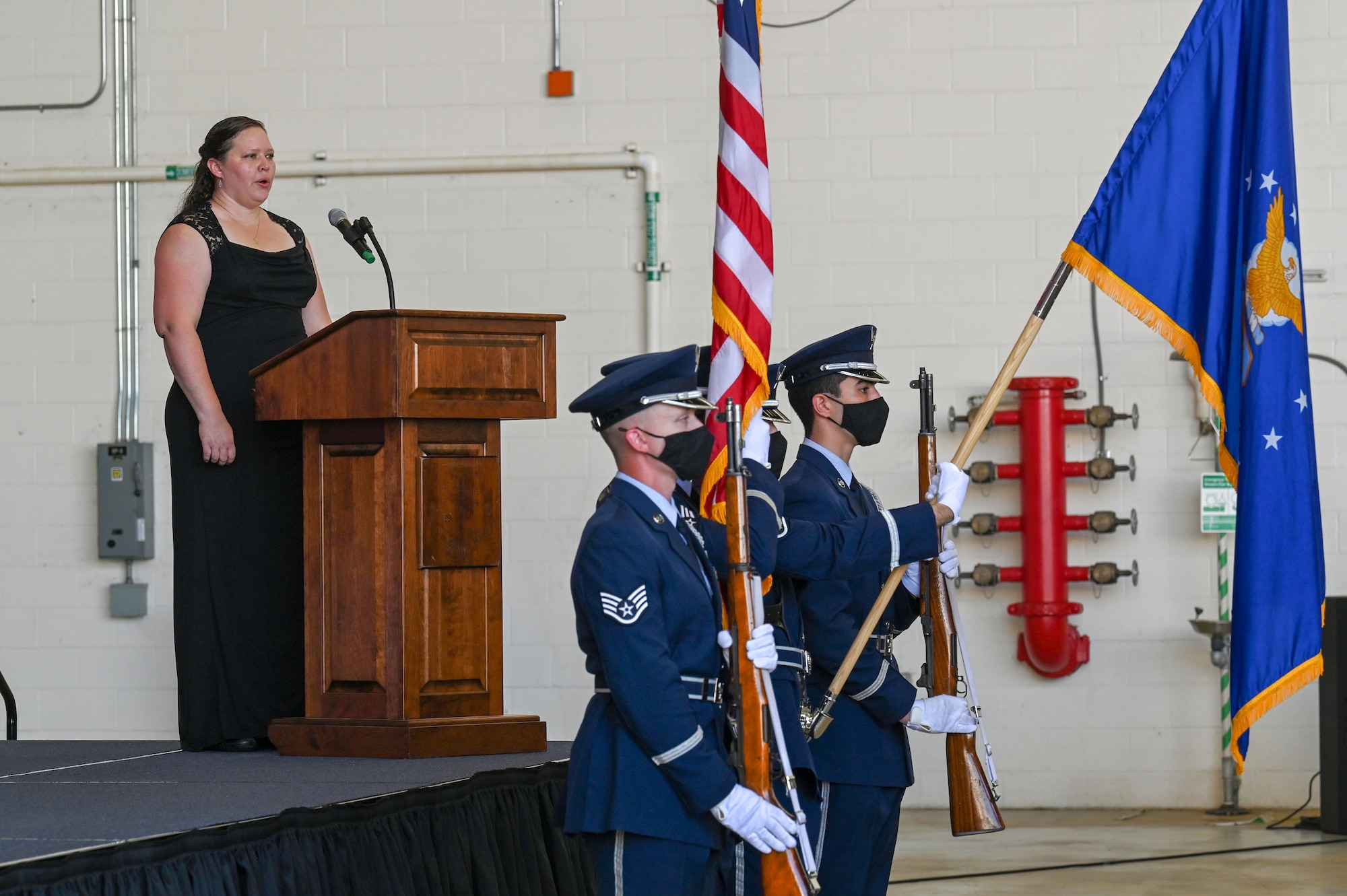 Airmen present the colors during a change of command ceremony.