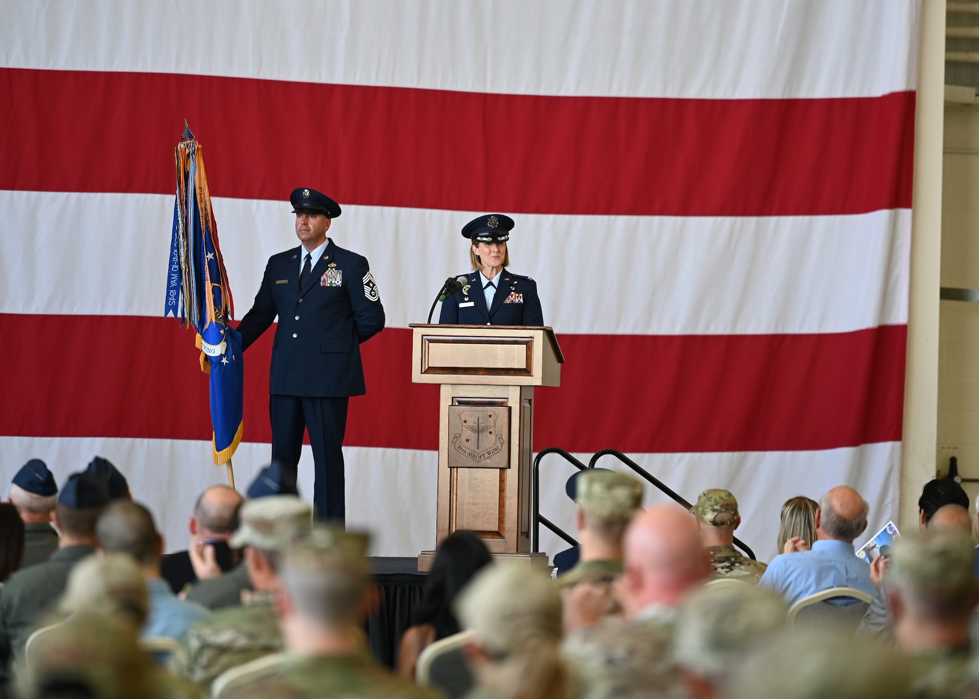 An Airman speaks during a change of command ceremony.