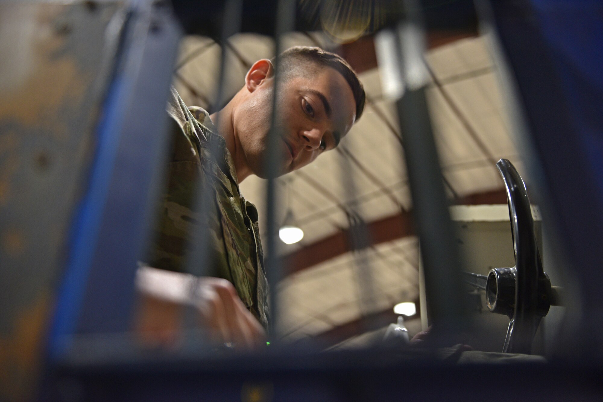 U.S. Air Force Tech. Sgt. Joseph Doyle, 17th Training Wing non-commissioned officer in charge of religious affairs, explores the controls inside of a Link Trainer at the National Women Airforce Service Pilots World War II Museum in Sweetwater, Texas, June 24, 2021. The Link Trainer was created in 1929 and was a safe replica of a cockpit used to teach all pilots proper flying procedures. (U.S. Air Force photo by Senior Airman Ashley Thrash)