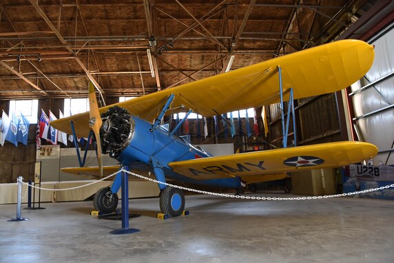A Boeing Stearman PT-17 “Kaydet” aircraft sits in a hanger inside the National Women Airforce Service Pilots Word War II Museum in Sweetwater, Texas, June 24, 2021. The aircraft was flown during the 1930s and 1940s as a military trainer aircraft. (U.S. Air Force photo by Senior Airman Jermaine Ayers)