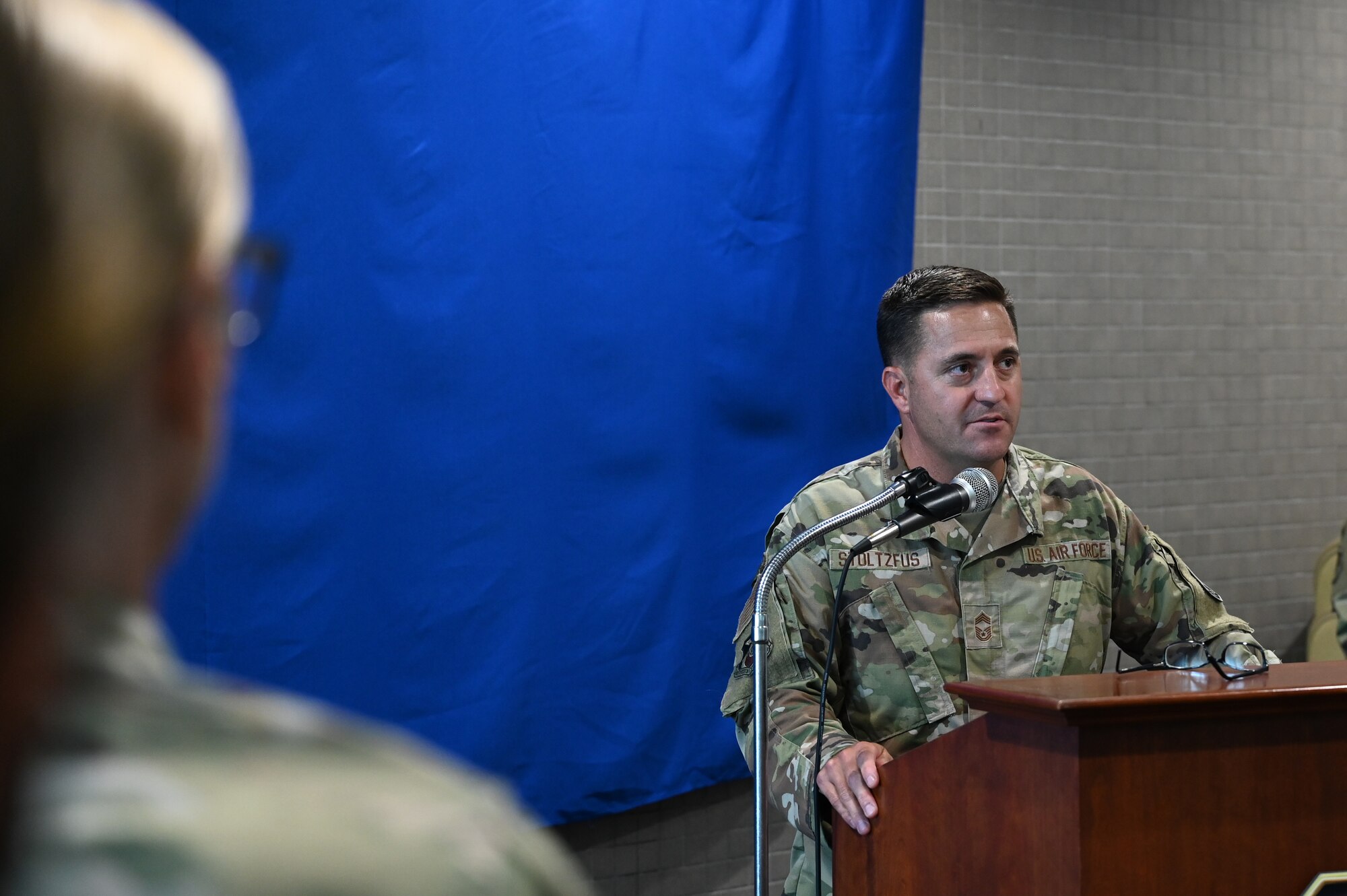 Chief Master Sgt. Justin G. Stoltzfus, 61st Air Base Group superintendent, speaks before an unveiling ceremony for an Enlisted Heritage wall at the South Bay Bar and Grill on Los Angeles Air Force Base, Calif., June 24, 2021. The wall is titled "CMSgt Lisa Arnold Enlisted Heritage Wall" after the current Space and Missile Systems Center's Command Chief Master Sgt. Lisa A. Arnold who will be the last U.S. Air Force command chief for Los Angeles AFB before being replaced by a U.S. Space Force Senior Enlisted Leader. (U.S. Space Force photo by Staff Sgt. Elijah Jackson)