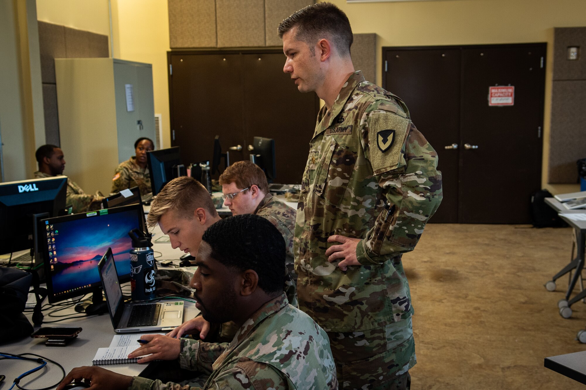 Army Maj. Matthew Szarzynski, 419th Contracting Support Brigade contracting officer, briefs airmen and soldiers at Fort Bragg, North Carolina, June 24, 2021. Szarynski was assigned to be the contracting detachment commander during the exercise. (U.S. Air Force photo by Airman 1st Class David Lynn)