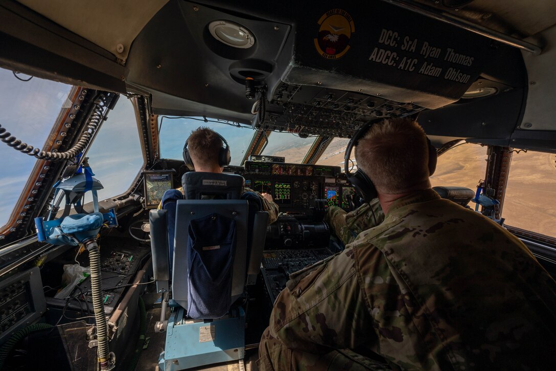 From the left, Capt. Shawn Moore, 9th Airlift Squadron pilot and Lt. Col. John Habbestad, 9th Airlift Squadron commander, fly a Dover Air Force Base C-5M Super Galaxy on a routine training mission over northern California, June 5, 2021. During a Major Command Service Tail Trainer, pilots and flight engineers were able to fly over the West Coast using visual flight rules. This requires crew members to use ground references to fly, exercising different skill sets not often used in day-to-day operations. (U.S. Air Force photo by Senior Airman Faith Schaefer)
