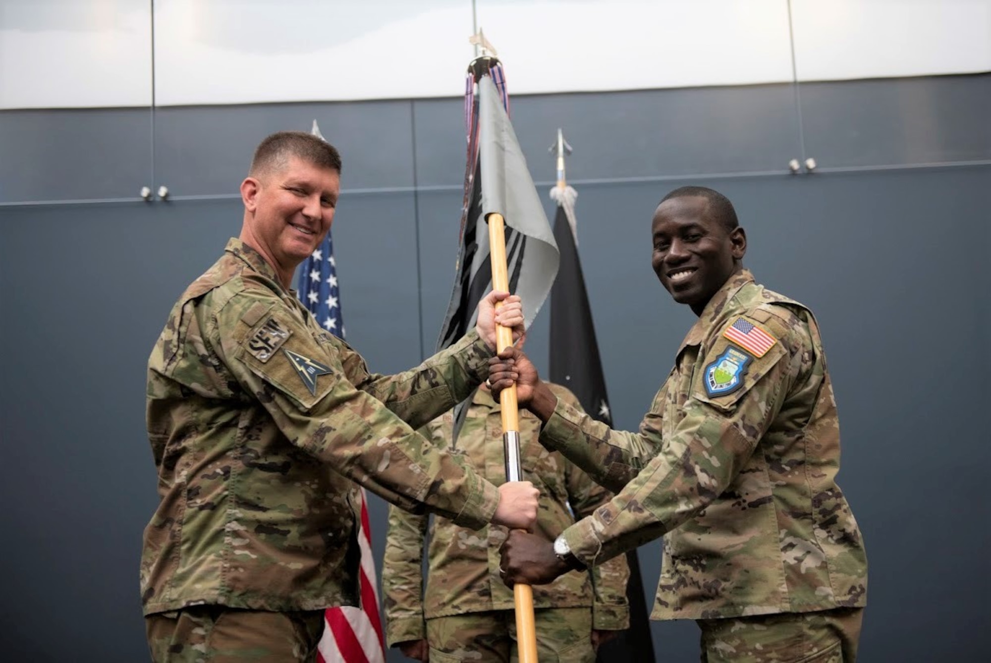 Men holding a flag