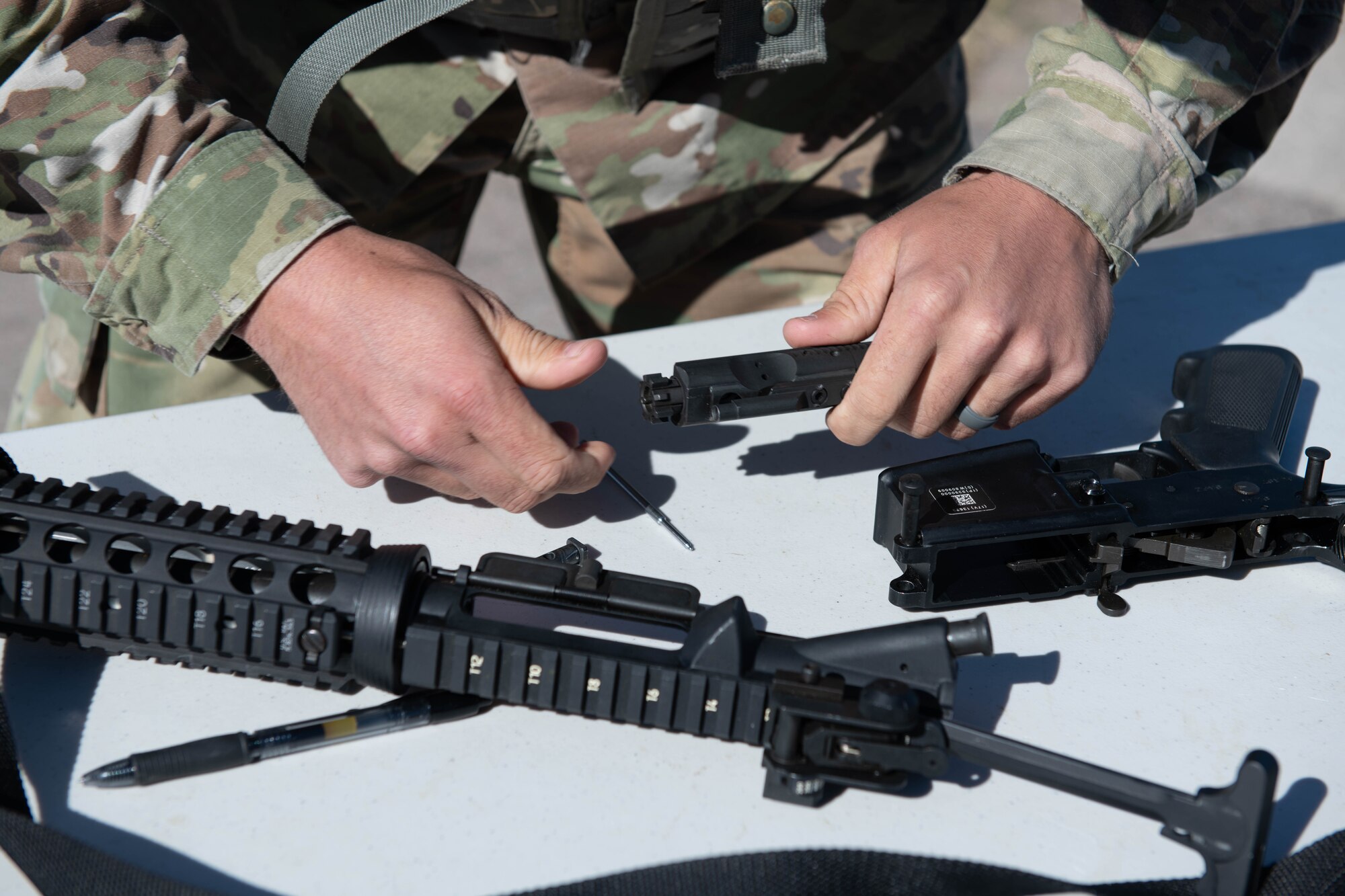 A 28th Civil Engineering Squadron power production journeyman, assembles an M4 Carbine.