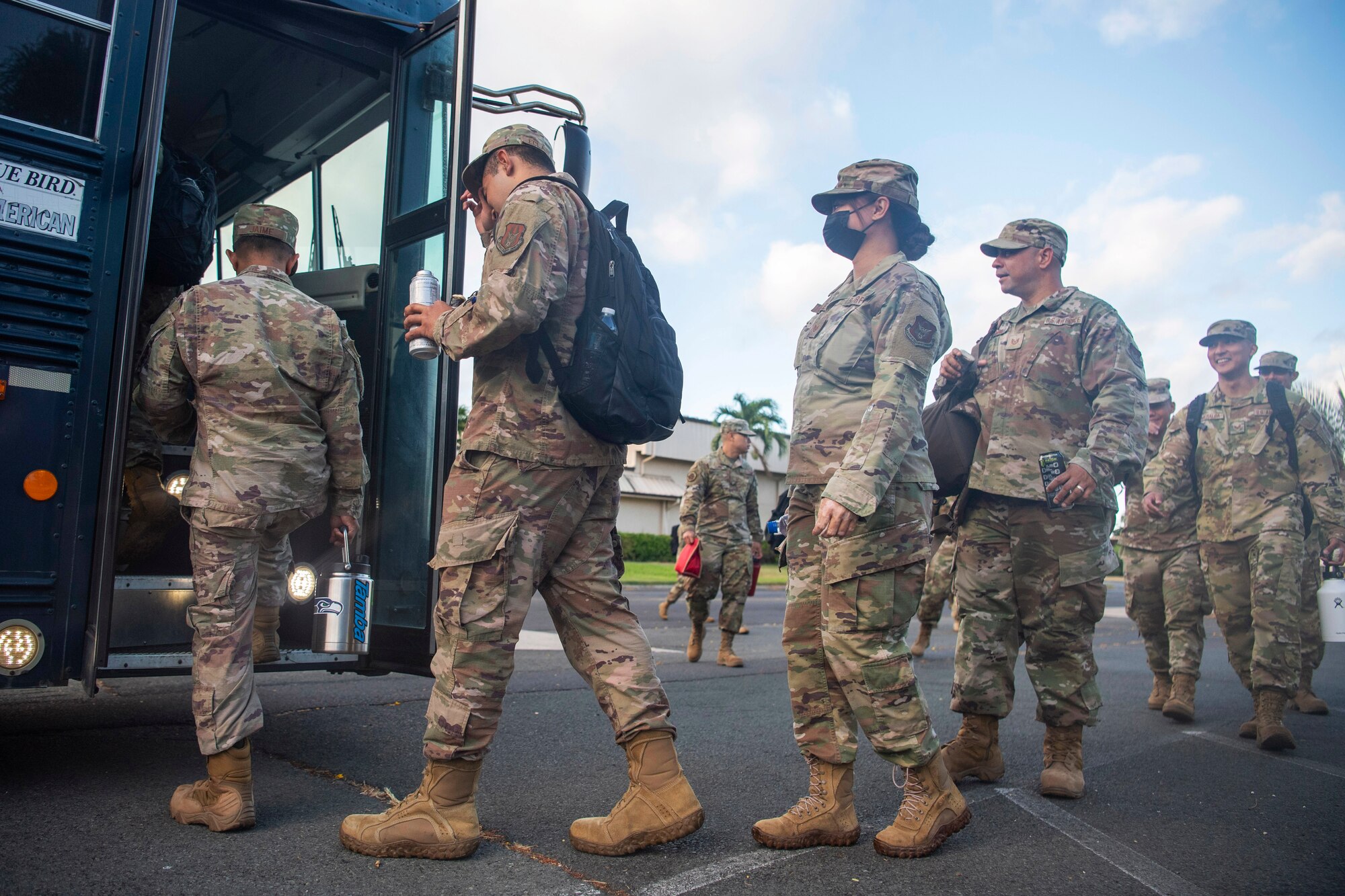 624th Civil Engineer Squadron (CES) Reserve Citizen Airmen aboard a bus while at Joint Base Pearl Harbor-Hickam, Hawaii, June 10, 2021. CES personnel will be part of a training Total Force Integration (TFI) event at Schofield Barracks, Hawaii. TFI is a blend of active, Guard, and Reserve personnel working together to accomplish the mission.