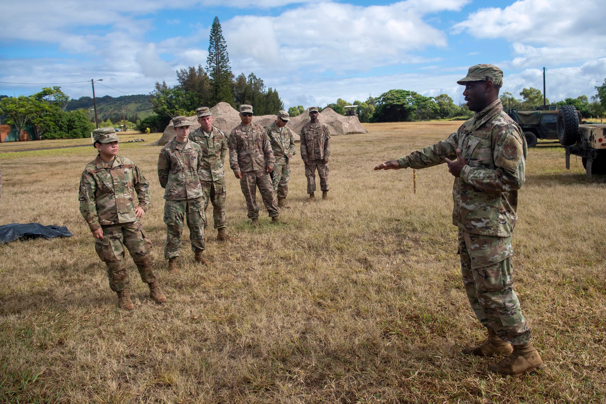 Tech Sgt. Reid Merriwether instructs Reserve Citizen Airmen from the 624th Regional Support Group on Search and Recovery (S&R) procedures during Pacific Warriorz 2021 (PWZ-21). PWZ-21 is a Total Force Integration and Joint Training exercise at Schofield Barracks, Hawaii June 12, 2021.