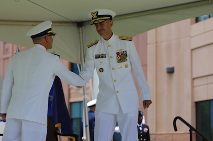 Camp H.M. Smith, Hawaii (June 25, 2021) Rear Admiral Charles Fosse, left, relieves Rear Admiral Robert Hayes, right, as Director of Joint Interagency Task Force West (JIATF West). Fosse becomes the 19th director of JIATF West, the executive agent for counter narcotics within the Indo-Pacific Command (INDOPACOM) area of operation.  As the JIATF West director, he is charged with leading more than 140 Soldiers, Sailors, Marines, Airmen, Coast Guardsmen, and Department of Defense civilians and is responsible for assisting U.S. law enforcement efforts in countering narcotics and the flow of illicit chemicals bound for the Western Hemisphere within the Indo-Pacific.
