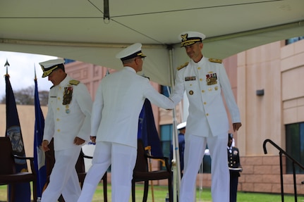 Camp H.M. Smith, Hawaii (June 25, 2021) Rear Admiral Charles Fosse, left, relieves Rear Admiral Robert Hayes, right, as Director of Joint Interagency Task Force West (JIATF West). Fosse becomes the 19th director of JIATF West, the executive agent for counter narcotics within the Indo-Pacific Command (INDOPACOM) area of operation.  As the JIATF West director, he is charged with leading more than 140 Soldiers, Sailors, Marines, Airmen, Coast Guardsmen, and Department of Defense civilians and is responsible for assisting U.S. law enforcement efforts in countering narcotics and the flow of illicit chemicals bound for the Western Hemisphere within the Indo-Pacific.