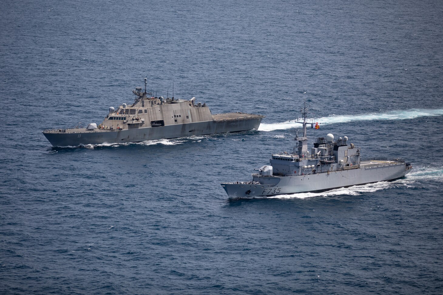 The Freedom-variant littoral combat ship USS Sioux City (LCS 11) conducts a bilateral maritime exercise with the French Navy Floréal-class frigate FS Germinal (F735)