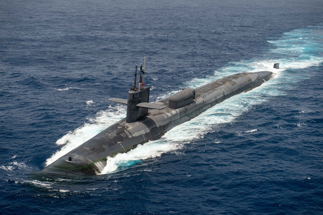 The guided-missile submarine USS Georgia (SSGN 729) transits the Arabian Sea, while operating with the Dwight D. Eisenhower Carrier Strike Group.